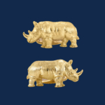 18k gold rhino cuff links handcrafted by alexander jewell for wildaid endangered species line of luxury jewelry